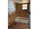 Under construction bathroom with new tub at 4829 Onyx Ln # 102, New Port Richey, FL 34652