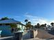 Coastal-style community building with palm trees at 4829 Onyx Ln # 102, New Port Richey, FL 34652
