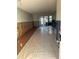 Under construction living room with new flooring at 4829 Onyx Ln # 102, New Port Richey, FL 34652