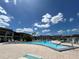 Community pool with clear blue water at 4829 Onyx Ln # 102, New Port Richey, FL 34652