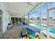 Screened patio with pool and canal views at 5102 Blue Heron Dr, New Port Richey, FL 34652