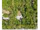 Aerial view highlighting the property's boundaries within a dense, lush forest, offering privacy and a serene setting at 6051 Valley Spring Dr, Brooksville, FL 34601