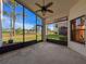 Spacious screened lanai with views of the well-maintained backyard at 9519 Green Needle Dr, New Port Richey, FL 34655