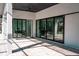 Spacious patio with large sliding doors, perfect for indoor-outdoor living at 12149 Chapman Ave, Port Charlotte, FL 33953