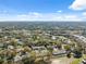 Expansive aerial view highlighting the neighborhood's lush landscapes and waterways at 7414 Heather Walk Dr, Weeki Wachee, FL 34613