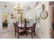 Bright breakfast nook featuring a view of the pool, adorned with floral decorations at 10124 Southern Breeze Ct, Weeki Wachee, FL 34613