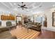 Comfortable living room featuring hardwood floors, recessed lighting, and elegant furnishings, offering a cozy atmosphere at 10124 Southern Breeze Ct, Weeki Wachee, FL 34613