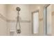 The shower has bright tile and a sleek fixture at 10124 Southern Breeze Ct, Weeki Wachee, FL 34613