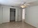 Bedroom featuring closet with sliding doors at 3421 Allandale Dr, Holiday, FL 34691