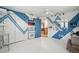 Bedroom with blue geometric design on the walls, ceiling fan, and closet at 6920 Medlar Dr, New Port Richey, FL 34653