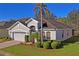 Well-maintained single-Gathering home with manicured landscaping, two-car garage, and a beautiful lawn at 11243 Merganser Way, New Port Richey, FL 34654