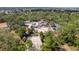 Aerial view of the community pool, splash pad, playground, and sand volleyball court at 13793 Dunwoody Dr, Spring Hill, FL 34609