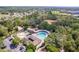 Aerial view of the community amenities including a pool, splash pad, and playground at 13793 Dunwoody Dr, Spring Hill, FL 34609