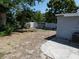 Spacious backyard with chain link dog kennel at 4011 W Mango Ave, Tampa, FL 33616