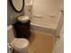 Bathroom featuring a vanity sink, mirror, and shower/tub combo at 4011 W Mango Ave, Tampa, FL 33616