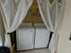 Laundry room featuring new washer and dryer at 4011 W Mango Ave, Tampa, FL 33616