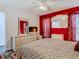 Comfortable bedroom with ample closet space, white dresser, and a large mirror on the wall at 12529 Shadow Ridge Blvd, Hudson, FL 34669