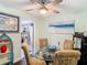 Bright dining area with view to the kitchen with stainless steel appliances at 12529 Shadow Ridge Blvd, Hudson, FL 34669