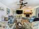 Beautiful living room with a stone fireplace, tv and comfortable seating at 12529 Shadow Ridge Blvd, Hudson, FL 34669