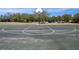 Outdoor basketball court offering a great space for recreational games and physical activity at 13822 Bee Tree Ct, Hudson, FL 34669