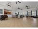 Spacious clubhouse featuring a kitchen, seating, and a pool table for residents to enjoy at 13822 Bee Tree Ct, Hudson, FL 34669