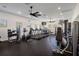Well-lit gym featuring a range of modern exercise equipment for a complete workout experience at 13822 Bee Tree Ct, Hudson, FL 34669