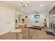 Bright and airy living room featuring modern decor, fireplace, and sliding glass doors to lanai at 9617 Norchester Cir, Tampa, FL 33647