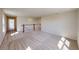 Open loft area with neutral carpeting and railing, perfect for a Gathering room or play area at 10126 Zennia Ln, Parrish, FL 34219