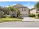 Charming two-story home with a well-manicured lawn and lovely landscaping at 12307 Duckett Ct, Spring Hill, FL 34610