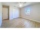 Bedroom featuring neutral walls, a ceiling fan, and a closet for extra storage at 4351 Castle Ave, Spring Hill, FL 34609