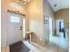 Bright foyer featuring high ceilings, tile floors, and decorative details at 1035 Dockside Dr, Lutz, FL 33559