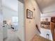Hallway with stairs leading to a view of a bedroom and the living room at 1203 Clays Trl # 406, Oldsmar, FL 34677