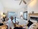 Cozy living area with natural light and access to the balcony, perfect for relaxation at 1203 Clays Trl # 406, Oldsmar, FL 34677