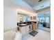 Bathroom featuring double sinks, granite countertops, tub, and access to the Primary bedroom at 1203 Clays Trl # 406, Oldsmar, FL 34677