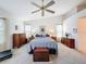 Bright main bedroom featuring a stylish bed, comfortable furnishings, and ample natural light at 1203 Clays Trl # 406, Oldsmar, FL 34677