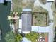 Overhead view of the property, highlighting backyard landscaping and dock at 14124 Kulig Ct, Hudson, FL 34667