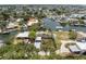 Aerial view of the property showcasing waterfront access and picturesque surroundings at 14124 Kulig Ct, Hudson, FL 34667