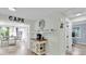 Cafe area that is open with natural light and a view to the kitchen, perfect for morning coffee at 14124 Kulig Ct, Hudson, FL 34667