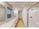 Modern bathroom featuring double vanity, glass shower, and ample counter space at 10118 Zennia Ln, Parrish, FL 34219