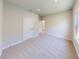 Bedroom with carpet floors, neutral paint, and a window providing natural light at 10123 Zennia Ln, Parrish, FL 34219