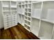 Well-organized walk-in closet features custom shelving, drawers, and ample storage space at 12102 Chapman Ave, Port Charlotte, FL 33953