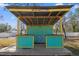 Backyard tiki bar, perfect for entertaining with its colorful design and spacious countertop at 13094 Tailorbird Ave, Brooksville, FL 34614