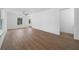 Bright, spacious living room featuring hardwood floors and neutral paint at 5173 Pacific Ave, Spring Hill, FL 34607