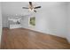 Bright living area with hardwood floors featuring an open floorplan at 5173 Pacific Ave, Spring Hill, FL 34607