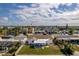 This waterfront home features a covered lanai, a well-kept lawn, and canal access to the Gulf at 13705 Allyn Dr, Hudson, FL 34667