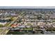 Waterfront home with a private dock and boat lift, located in a quiet neighborhood with canal access at 13705 Allyn Dr, Hudson, FL 34667