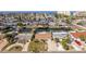 An elevated view showcases a property nestled within a network of scenic canals in a coastal community at 13705 Allyn Dr, Hudson, FL 34667