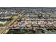 Scenic aerial view of a canal-front community, perfect for boating and enjoying waterfront living at 13705 Allyn Dr, Hudson, FL 34667