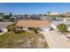 Aerial view showcases home's location in a quiet residential neighborhood close to city amenities at 13705 Allyn Dr, Hudson, FL 34667