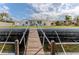 Charming waterfront property with a private dock and inviting backyard, perfect for enjoying the coastal lifestyle at 13705 Allyn Dr, Hudson, FL 34667